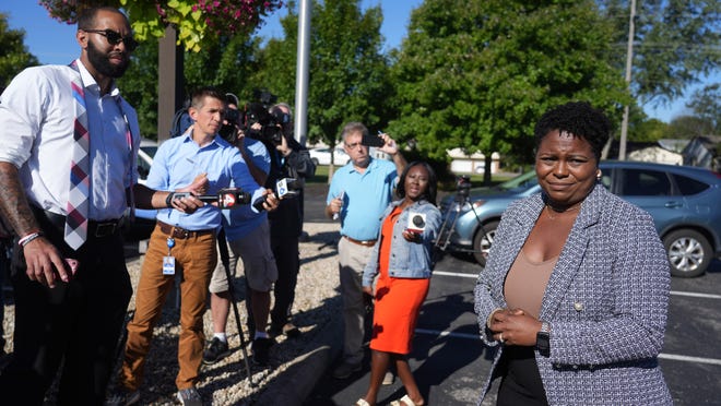 ; Family attorney Chanda Brown talks with the media moments after Blendon Township released Ta'Kiya Young police shooting bodycam video.